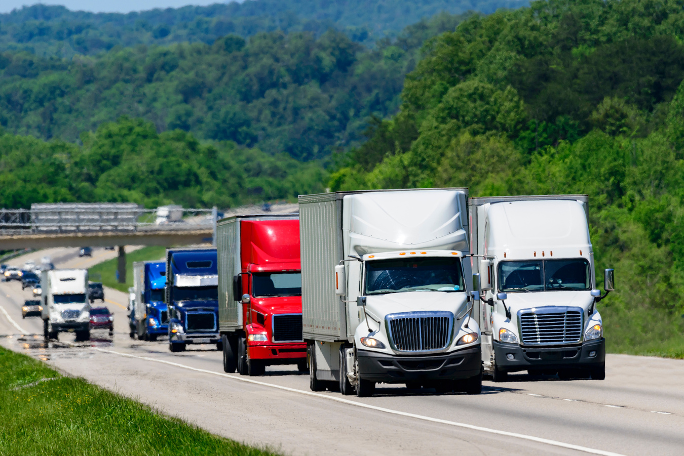 Trucks Running Down The Interstate Highway